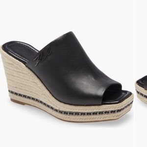 Brand New in box. I am a huge fan of the brand Karl Lagerfeld. Cute on the shoe